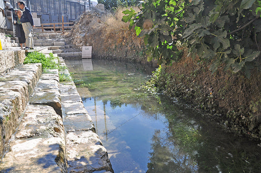 Ancient Pool of Siloam in Jerusalem, a historic biblical site associated with ritual washing, spiritual cleansing, and the study of baptism in the Bible.
